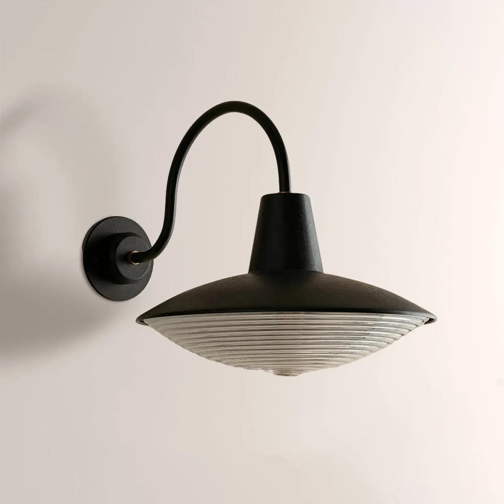 Cedric Blackened Iron Ribbed Glass Outdoor Sconce